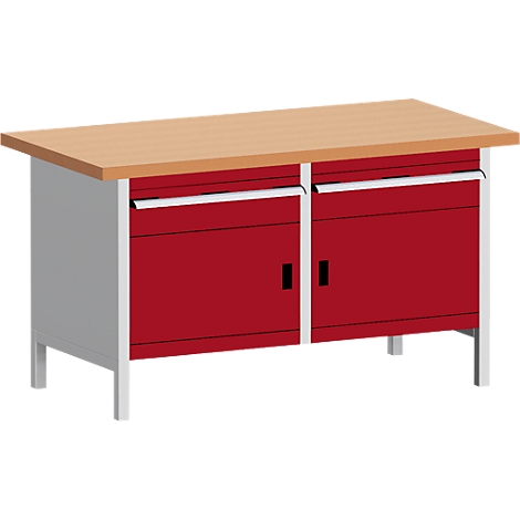 Werkbank mit roter Schublade und hellbrauner Arbeitsplatte.