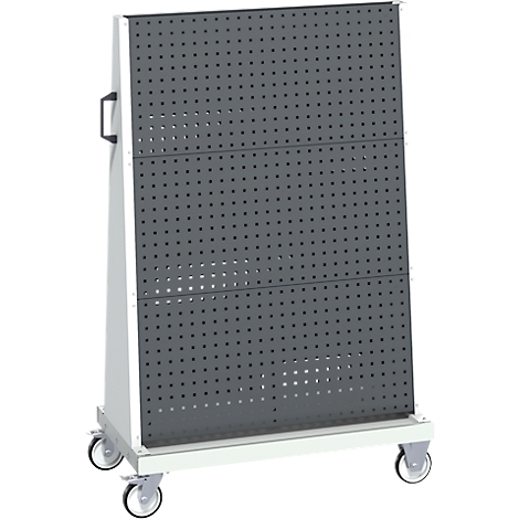 Graue Lochwand auf weißem, rollbarem Gestell. Schwarzer Griff an der Seite.