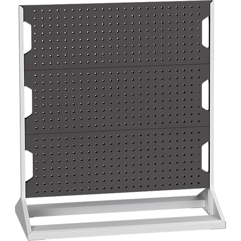 Graue Lochwand auf weißem Gestell, mit drei waagerechten Feldern. Kleinere Löcher sind gleichmäßig verteilt.