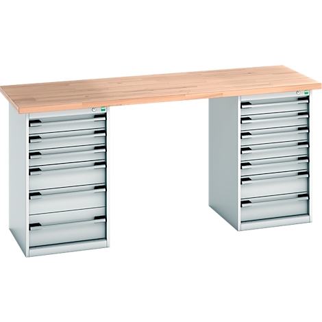 Werkbank met houten werkblad, twee ladekasten en metalen handgrepen.