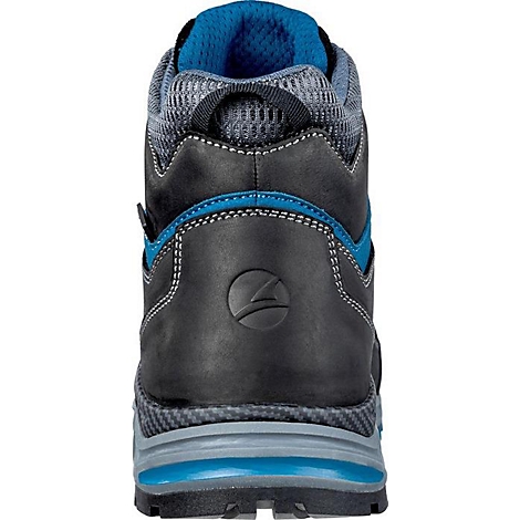 Chaussure de travail noire, plan de détail de l'arrière. Garnitures bleues, semelle gris-noir et textile sur la tige.