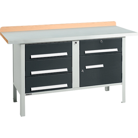 Workbench with gray top, dark drawers, and wooden edge. Metal legs below.