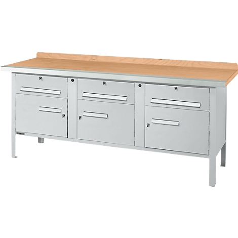 Metal workbench with wooden top and drawers.