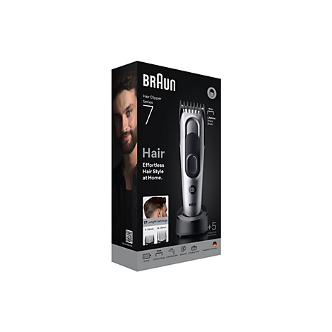 Braun Haarschneider Series 7 in der Verpackung mit Zubehör und Produktbild eines Mannes.