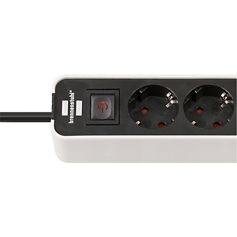 Gros plan d'un appareil blanc rectangulaire avec un interrupteur noir et un câble noir qui dépasse.