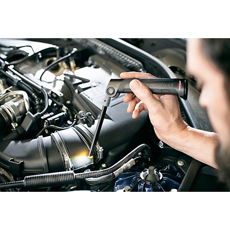 Lampe de travail à LED noire avec une tête de lampe rotative et deux câbles de charge USB.