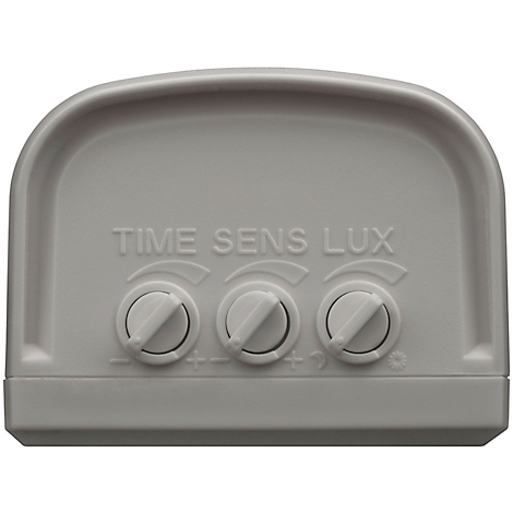 Grauer Bewegungsmelder mit drei Drehreglern und der Aufschrift TIME SENS LUX. Unter den Reglern sind Symbole abgebildet.