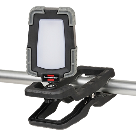 De werklamp is bevestigd aan een houder die aan een metalen buis is bevestigd.