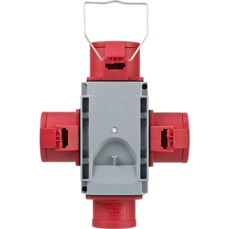 Prise multiple avec une prise rouge et un boîtier gris. Une poignée de transport est fixée en haut.