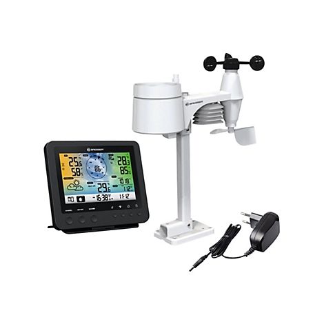 Digitale Bresser Wetterstation mit Außensensor, Displayeinheit und Netzteil vor weißem Hintergrund.
