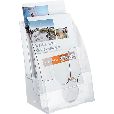 Transparent brochure holder with brochures. A brochure reads: "Your health. Our services."