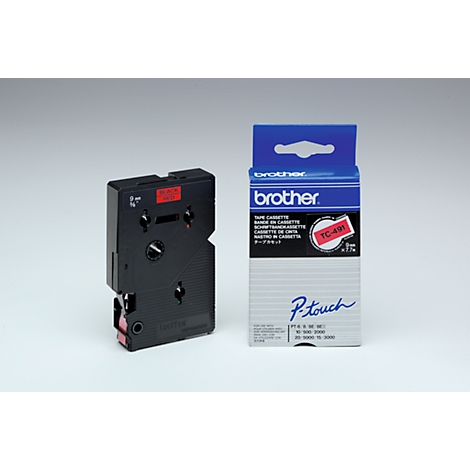 A black label cassette and a blue cardboard package with print. A red stripe is visible on the cassette, the package has a white background and is printed with the "brother" logo.