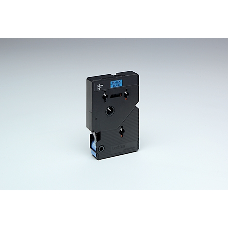 Black label cassette with blue accents. Inscription 'BLACK/BLUE'. Standing on a light background.