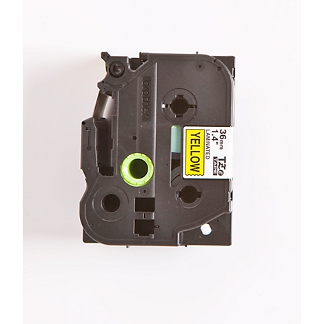 Black label cassette with yellow label. Inscription: YELLOW, 36mm, 1.4", LAMINATED.