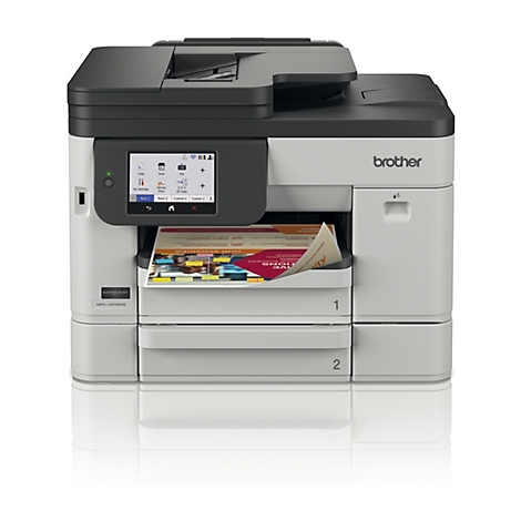 Grauer Brother Multifunktionsdrucker mit Touchscreen und bedrucktem Blatt Papier.