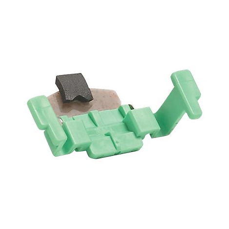 Ein grünes Kunststoffteil, mit schwarzem und beigem Material.