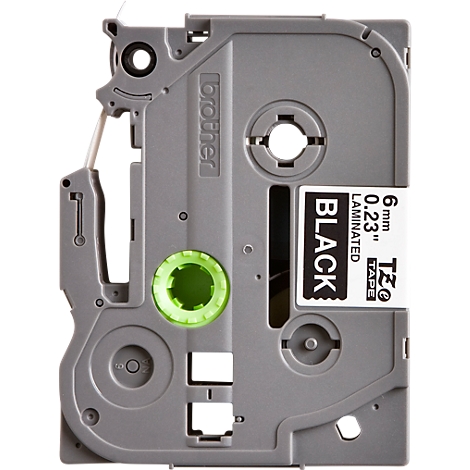 A gray label cassette with black text. It says "BLACK", "6mm 0.23" and "Brother".