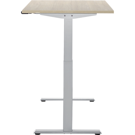 In hoogte verstelbaar bureau met een lichtbruin tafelblad en een grijs metalen frame.