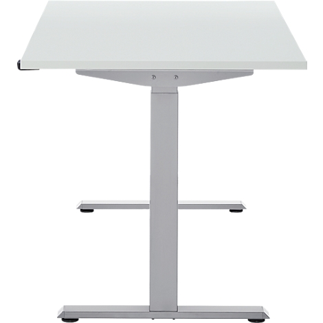 Een witte in hoogte verstelbare bureau, gefotografeerd van onderaf.