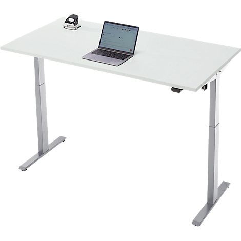 Een witte in hoogte verstelbare bureau met een laptop en nietmachine.