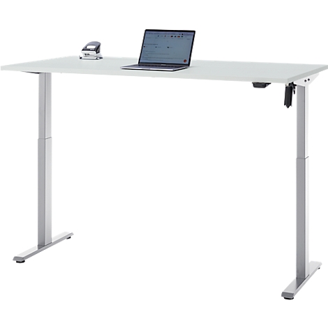 Wit, in hoogte verstelbaar bureau met laptop en nietmachine. Metalen poten.