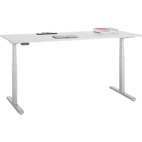 Witte, in hoogte verstelbare bureau met spullen erop. Grijze poten, wit bord. Boven: tablet, notities.