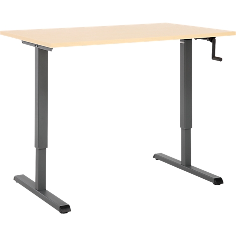 Un bureau réglable en hauteur avec un plateau de table brun clair et des pieds gris. La manivelle de réglage de la hauteur est montée à droite.