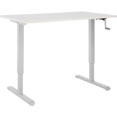 Un bureau blanc réglable en hauteur. La manivelle est à droite.