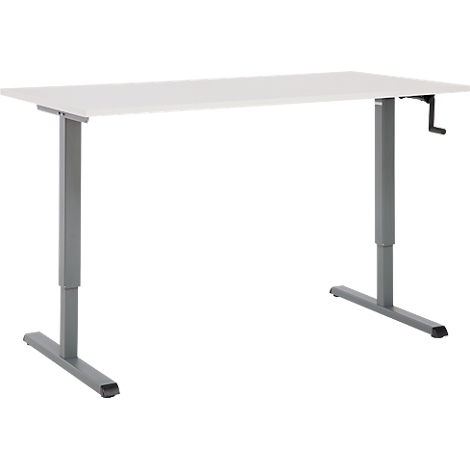 Un bureau réglable en hauteur avec des pieds gris et un plateau blanc. Il y a une manivelle sur le côté droit.