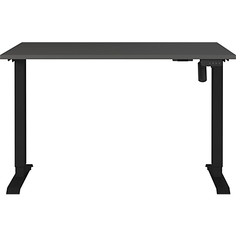 Un bureau gris réglable en hauteur avec des pieds noirs. Sur le côté droit se trouve une commande pour le réglage de la hauteur.