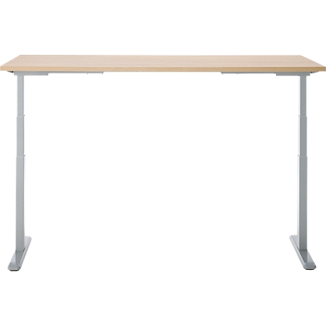 Un bureau clair et réglable en hauteur avec un plateau en bois et des pieds en métal gris. Le fond est blanc.