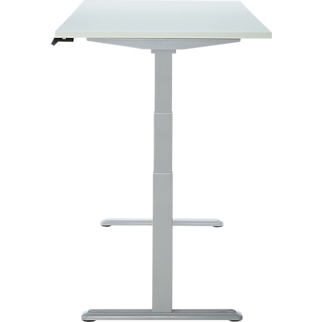 Un bureau blanc réglable en hauteur, photographié de face.