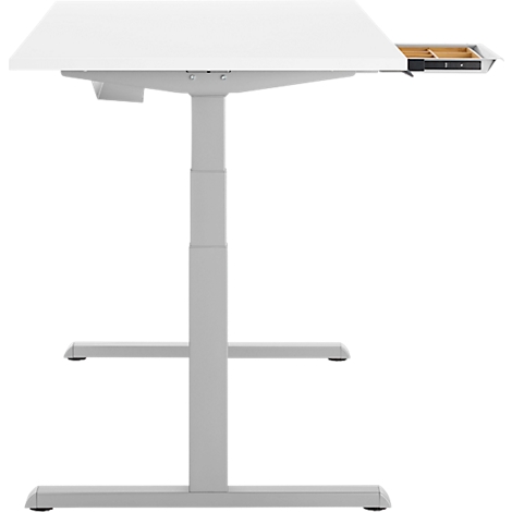 Bureau blanc réglable en hauteur avec un plateau légèrement incliné. Un tiroir est ouvert.