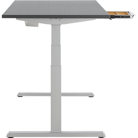 Bureau réglable en hauteur avec plateau gris et cadre clair. Un tiroir est ouvert.