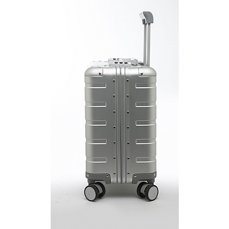 Valise argentée avec poignée télescopique et roulettes, sur fond blanc.