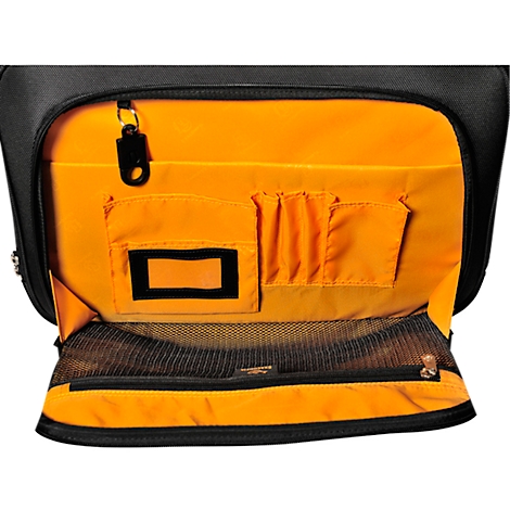 Close-up of the open interior of a black bag with orange interior pockets.