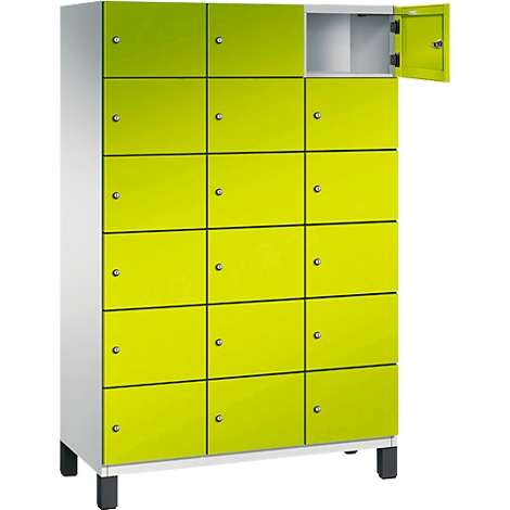 Kast met 16 neonkleurige deuren, één deur is open.