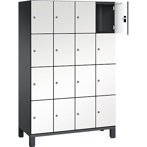 Kast met 16 compartimenten, wit met grijze frames. Eén deur is open.