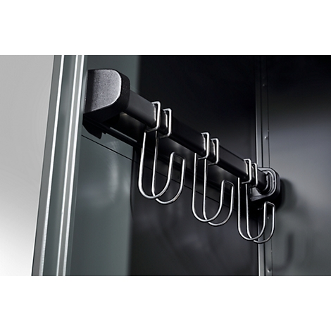 Black hook rail with 6 metal hooks, mounted on a grey cabinet wall.