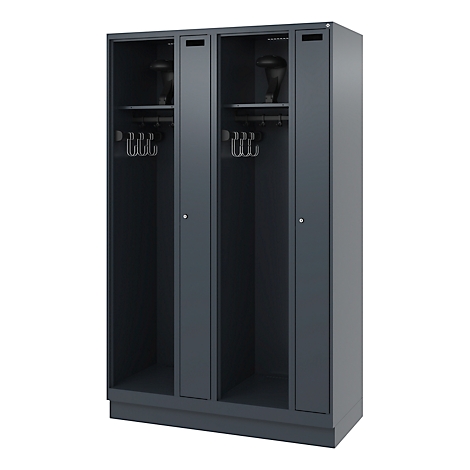 Grey locker with four compartments, hooks and shelves on which helmets are placed.
