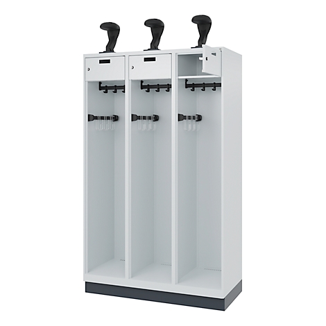 A white cabinet with three compartments and black handles. Above each is a black hook, below it are several coat hooks.