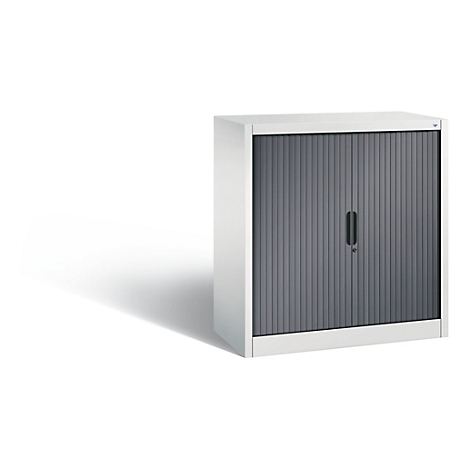 A gray cabinet with roller shutter against a white background.