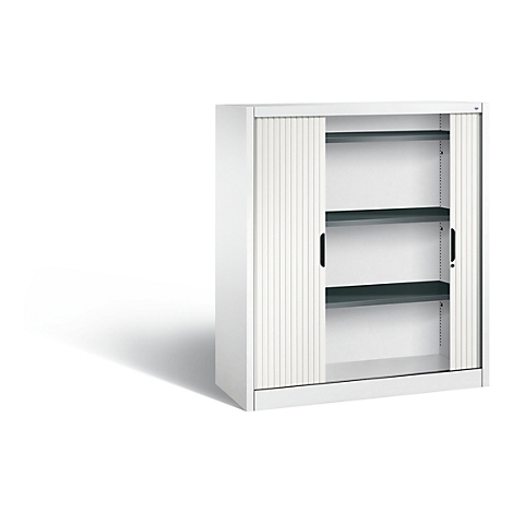 White cabinet with roller shutter and three shelves. One door is open.