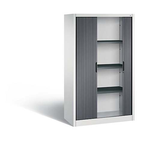 White cabinet with grey roller shutters and shelves. On a light background, shadow.