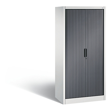 A white cabinet with a gray roller shutter door. Black handle and lock. Shadow on a light background.