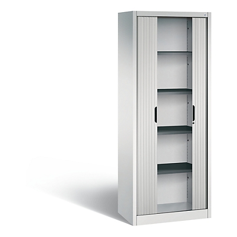 White cabinet with roller shutters and black handles. Interior shelves. Shadow.