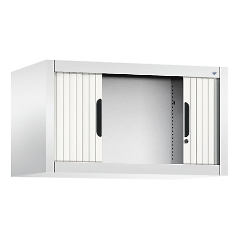 White wall cabinet with roller shutter. The cabinet is open, with black handles and a blue logo.