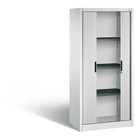 Witte kast met roldeur, drie planken, zwarte handgrepen. Schaduw op witte achtergrond.