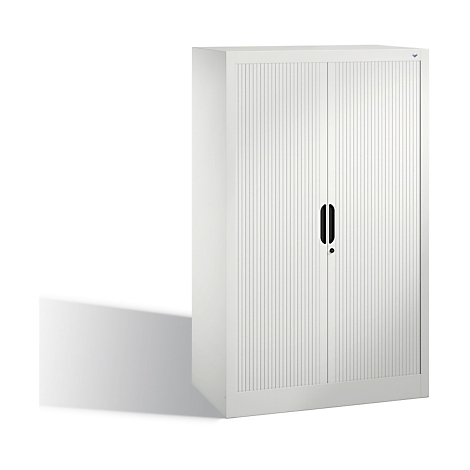 Weißer Aktenschrank mit geriffelten Türen und schwarzem Griff. Ein Schatten liegt auf dem Boden.