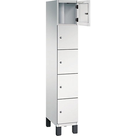 Schrank mit vier abschließbaren Fächern, obere Tür geöffnet.
